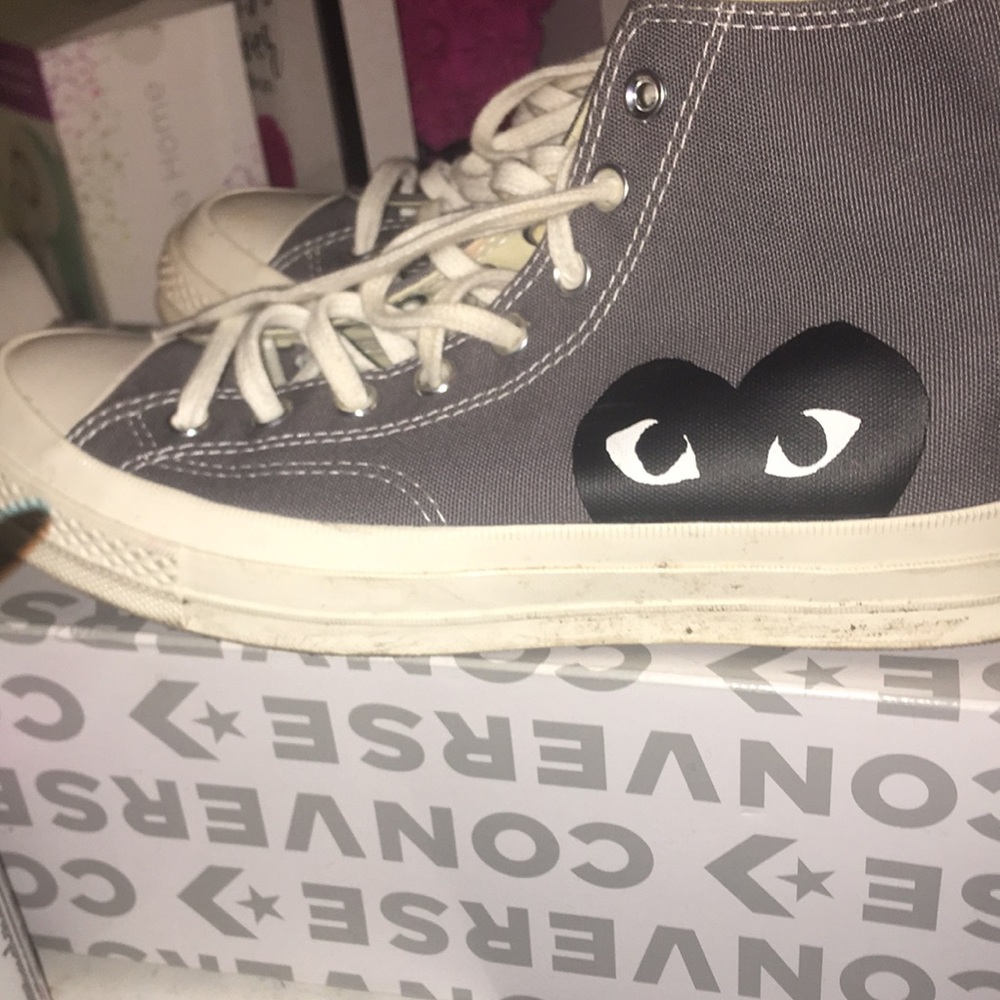 Grey converse with black hearts on side